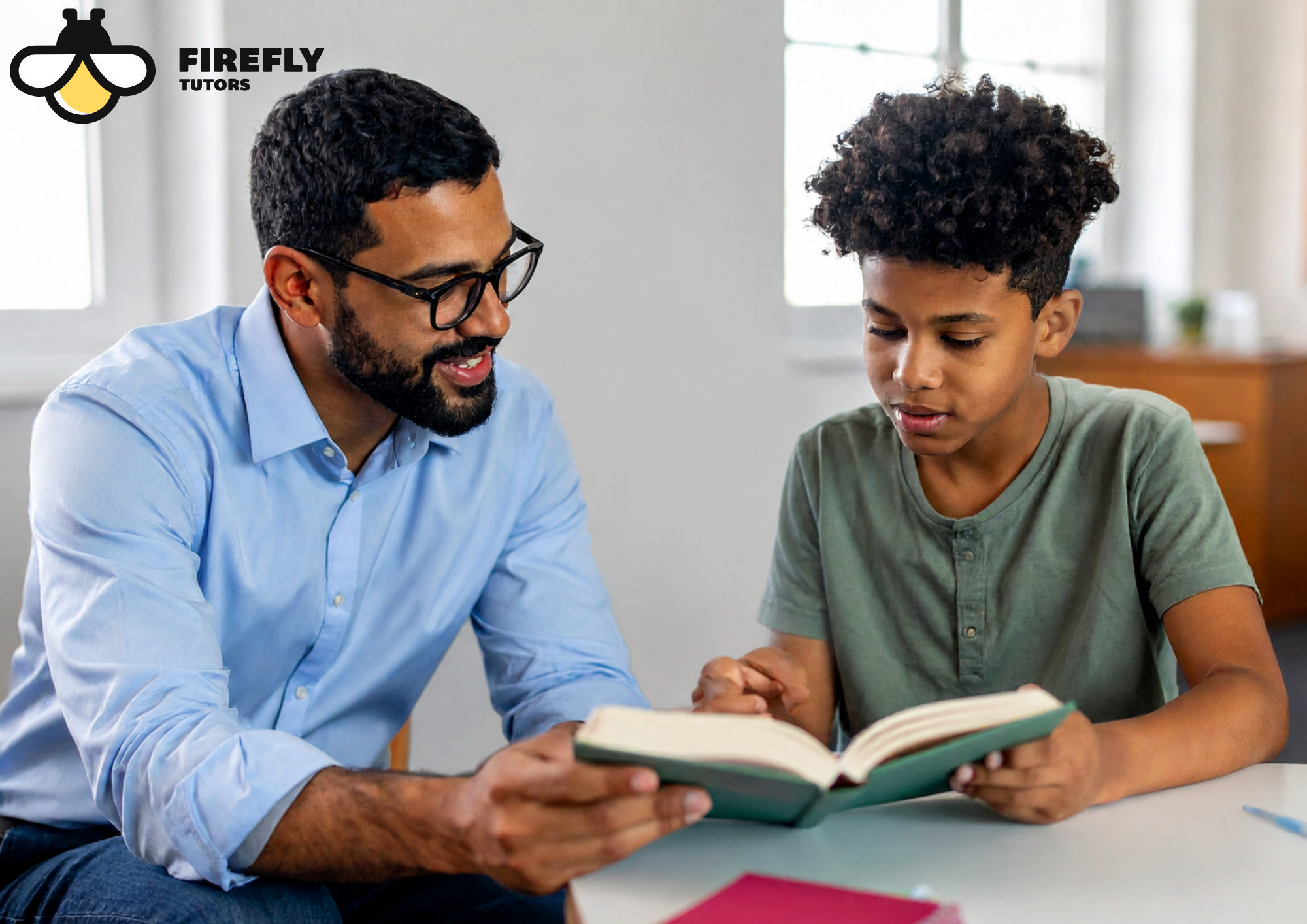 Firefly Tutors tutor working one-on-one with a student on reading during a personalized tutoring session